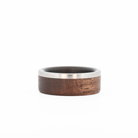 Walnut Ring with Titanium and Carbon Fiber Laying Flat