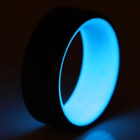 Blue Glowing Resin Ring with Carbon Fiber Exterior close up