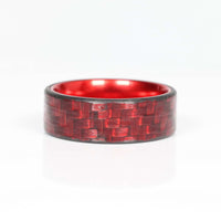 Red Carbon Fiber Men's Ring With Red Aluminum Interior Laying Flat