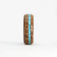 Turquoise Inlay Ring with Whiskey Barrel Wood and Carbon Fiber Sleeve Front View
