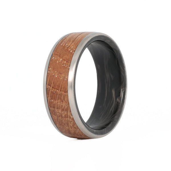 men's whiskey barrel wedding ring with titanium rails and forged carbon fiber sleeve