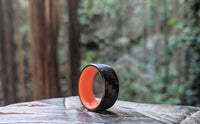 Orange Glow Ring with Carbon Fiber Outside In A Forest