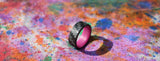 Purple Glow In The Dark Ring with Carbon Fiber on a colorful canvas