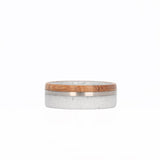 White Concrete Wedding Ring with Titanium Inlay and Whiskey Barrel Wood Laying Flat