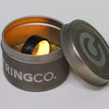 Orange Glow Ring with Carbon Fiber Glowing In Its Container