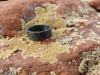 Carbon Fiber Glow Ring On Mossy Rock