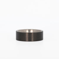 Men's Titanium Wedding Ring with Carbon Fiber Exterior Laying Flat