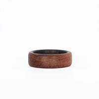 rosewood ring with carbon fiber sleeve laying flat