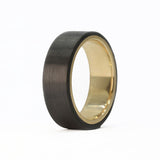 men's gold wedding ring with carbon fiber