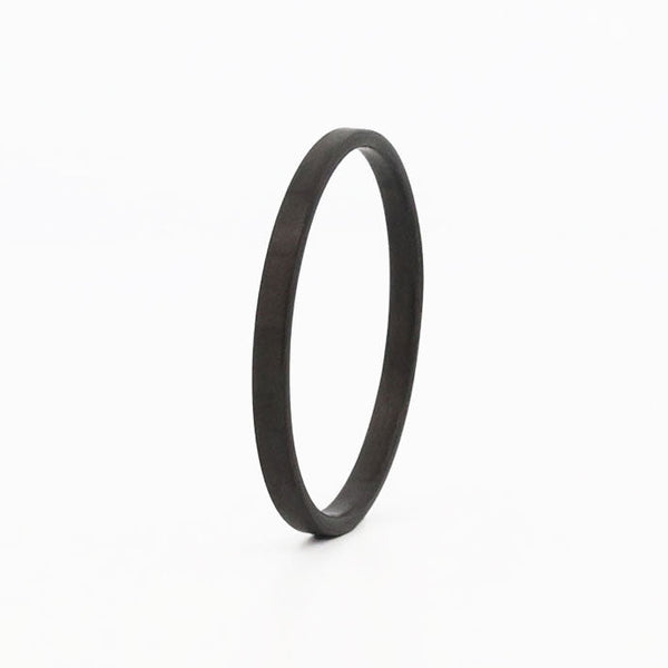 black stackable ring made from carbon fiber