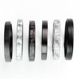 Carbon Fiber Stackable Ring featured with other stackable rings by Element Ring Co.